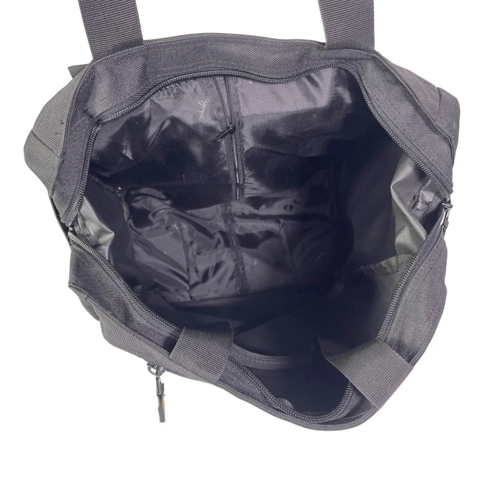Olympia Sports Plus Rolling Tote Bag Travel Bag Black Canvas Retractable Handle